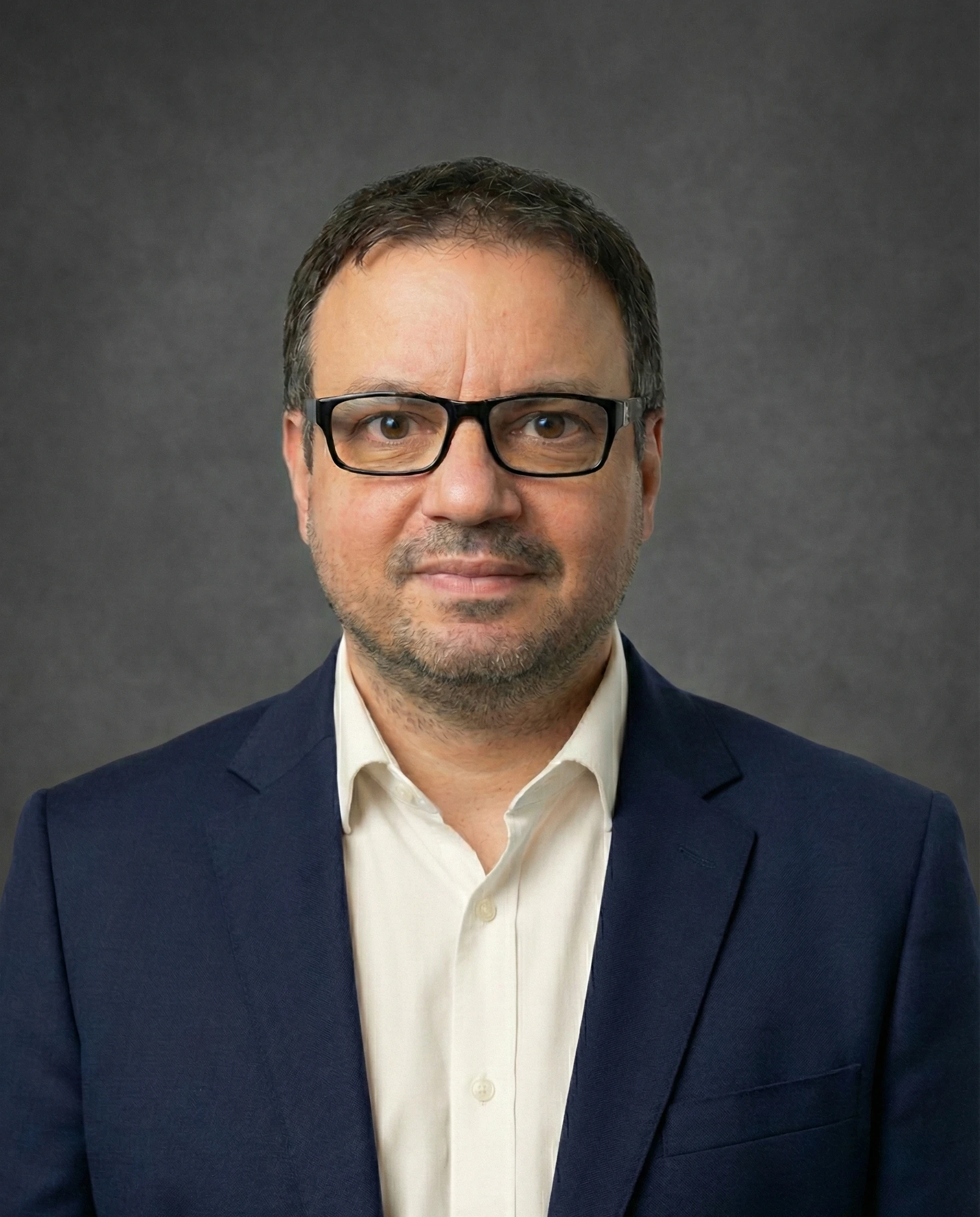 Headshot of founder Nick Iliopoulos.
